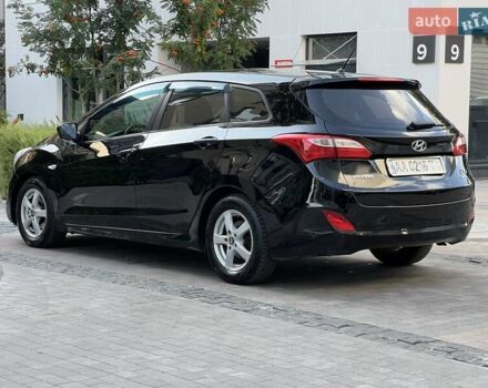 Черный Хендай i30, объемом двигателя 1.58 л и пробегом 153 тыс. км за 9500 $, фото 22 на Automoto.ua