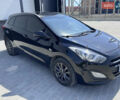 Чорний Хендай i30, об'ємом двигуна 1.4 л та пробігом 283 тис. км за 9500 $, фото 1 на Automoto.ua
