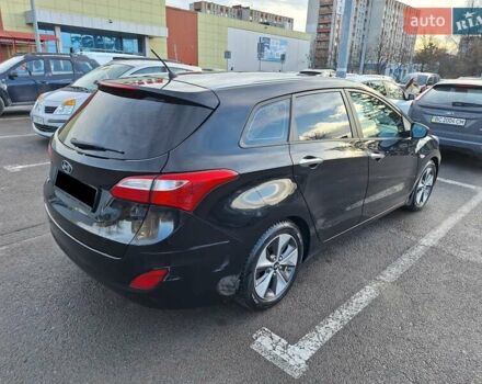 Чорний Хендай i30, об'ємом двигуна 1.58 л та пробігом 136 тис. км за 9100 $, фото 7 на Automoto.ua