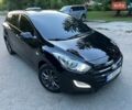 Черный Хендай i30, объемом двигателя 1.4 л и пробегом 296 тыс. км за 7700 $, фото 1 на Automoto.ua
