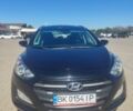 Черный Хендай i30, объемом двигателя 1.6 л и пробегом 253 тыс. км за 9800 $, фото 1 на Automoto.ua
