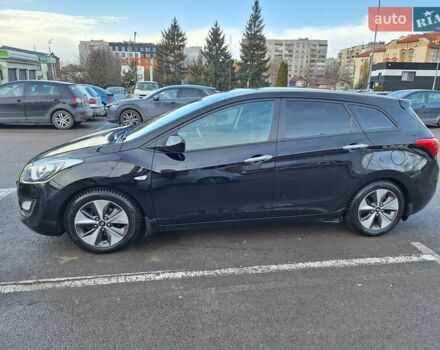 Чорний Хендай i30, об'ємом двигуна 1.58 л та пробігом 136 тис. км за 9100 $, фото 4 на Automoto.ua