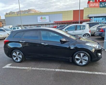 Чорний Хендай i30, об'ємом двигуна 1.58 л та пробігом 136 тис. км за 9100 $, фото 8 на Automoto.ua