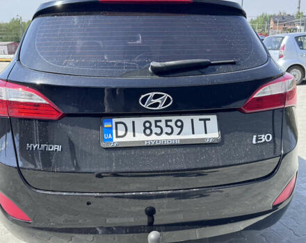 Чорний Хендай i30, об'ємом двигуна 1.4 л та пробігом 283 тис. км за 9500 $, фото 3 на Automoto.ua