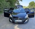 Чорний Хендай i30, об'ємом двигуна 1.4 л та пробігом 236 тис. км за 10400 $, фото 1 на Automoto.ua