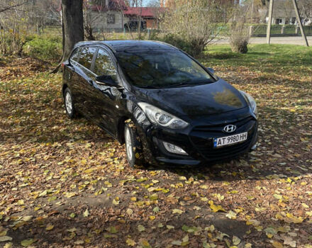Черный Хендай i30, объемом двигателя 1.58 л и пробегом 290 тыс. км за 10800 $, фото 4 на Automoto.ua