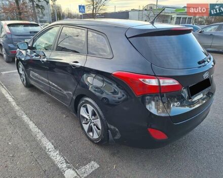 Чорний Хендай i30, об'ємом двигуна 1.58 л та пробігом 136 тис. км за 9100 $, фото 5 на Automoto.ua