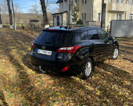 Черный Хендай i30, объемом двигателя 1.58 л и пробегом 290 тыс. км за 10800 $, фото 2 на Automoto.ua
