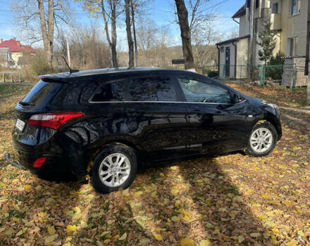 Черный Хендай i30, объемом двигателя 1.58 л и пробегом 290 тыс. км за 10800 $, фото 3 на Automoto.ua