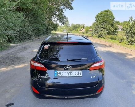 Чорний Хендай i30, об'ємом двигуна 1.4 л та пробігом 236 тис. км за 10400 $, фото 1 на Automoto.ua