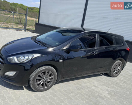 Чорний Хендай i30, об'ємом двигуна 1.4 л та пробігом 283 тис. км за 9500 $, фото 1 на Automoto.ua