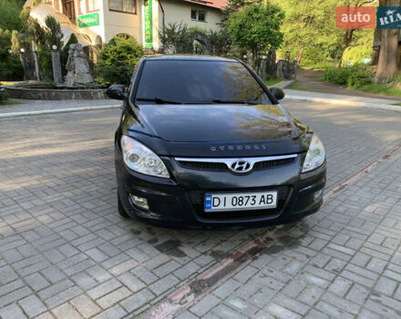Черный Хендай i30, объемом двигателя 1.6 л и пробегом 233 тыс. км за 6099 $, фото 1 на Automoto.ua