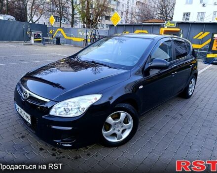 Черный Хендай i30, объемом двигателя 1.4 л и пробегом 170 тыс. км за 5800 $, фото 1 на Automoto.ua