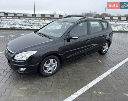 Черный Хендай i30, объемом двигателя 1.6 л и пробегом 169 тыс. км за 6150 $, фото 1 на Automoto.ua