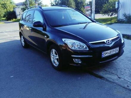 Черный Хендай i30, объемом двигателя 1.6 л и пробегом 232 тыс. км за 6600 $, фото 1 на Automoto.ua