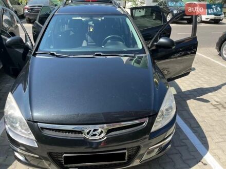 Черный Хендай i30, объемом двигателя 1.58 л и пробегом 234 тыс. км за 5650 $, фото 1 на Automoto.ua