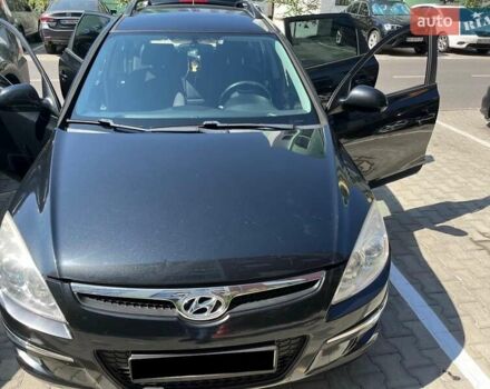 Черный Хендай i30, объемом двигателя 1.58 л и пробегом 234 тыс. км за 5650 $, фото 1 на Automoto.ua