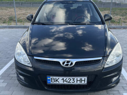 Черный Хендай i30, объемом двигателя 1.58 л и пробегом 227 тыс. км за 5900 $, фото 1 на Automoto.ua
