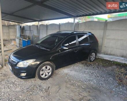 Черный Хендай i30, объемом двигателя 1.58 л и пробегом 270 тыс. км за 4600 $, фото 1 на Automoto.ua