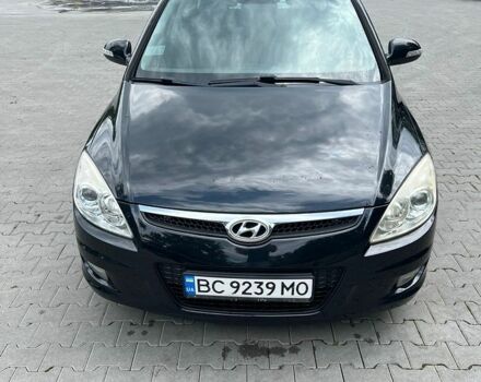 Черный Хендай i30, объемом двигателя 1.58 л и пробегом 293 тыс. км за 5300 $, фото 1 на Automoto.ua
