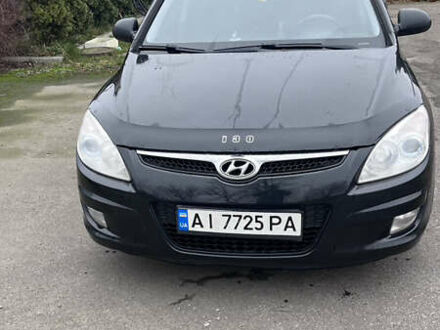 Черный Хендай i30, объемом двигателя 1.6 л и пробегом 255 тыс. км за 6800 $, фото 1 на Automoto.ua