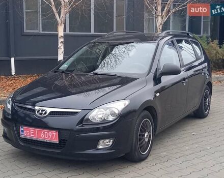 Черный Хендай i30, объемом двигателя 1.4 л и пробегом 216 тыс. км за 6300 $, фото 1 на Automoto.ua