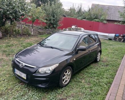 Черный Хендай i30, объемом двигателя 1.4 л и пробегом 139 тыс. км за 6200 $, фото 1 на Automoto.ua