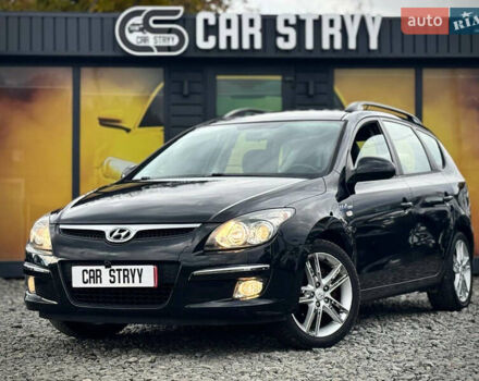 Черный Хендай i30, объемом двигателя 1.6 л и пробегом 187 тыс. км за 6900 $, фото 1 на Automoto.ua