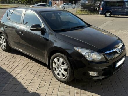 Черный Хендай i30, объемом двигателя 1.6 л и пробегом 289 тыс. км за 5400 $, фото 1 на Automoto.ua