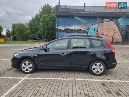 Чорний Хендай i30, об'ємом двигуна 1.6 л та пробігом 128 тис. км за 7700 $, фото 1 на Automoto.ua