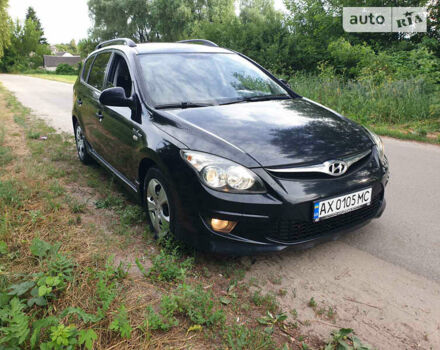 Черный Хендай i30, объемом двигателя 1.6 л и пробегом 253 тыс. км за 6400 $, фото 1 на Automoto.ua