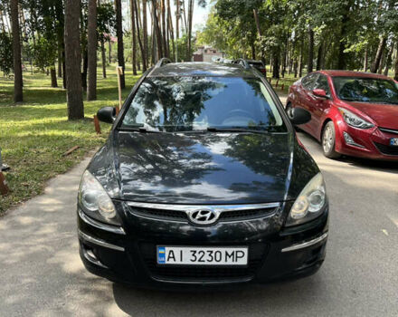 Черный Хендай i30, объемом двигателя 1.4 л и пробегом 241 тыс. км за 5600 $, фото 1 на Automoto.ua
