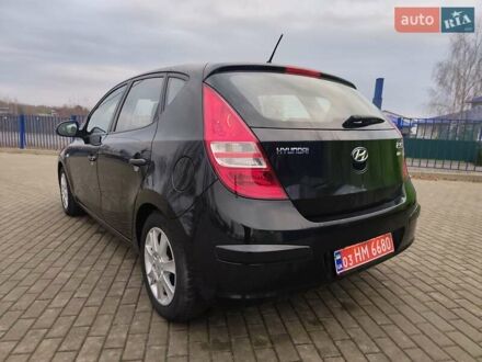 Черный Хендай i30, объемом двигателя 1.4 л и пробегом 161 тыс. км за 5700 $, фото 1 на Automoto.ua