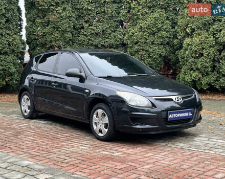 Черный Хендай i30, объемом двигателя 1.4 л и пробегом 240 тыс. км за 6000 $, фото 1 на Automoto.ua