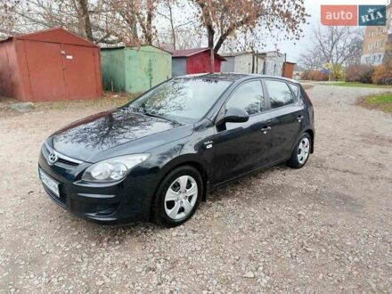Черный Хендай i30, объемом двигателя 1.4 л и пробегом 314 тыс. км за 5650 $, фото 1 на Automoto.ua