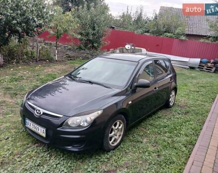 Черный Хендай i30, объемом двигателя 1.4 л и пробегом 140 тыс. км за 5950 $, фото 1 на Automoto.ua