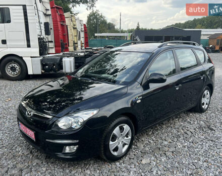 Черный Хендай i30, объемом двигателя 1.4 л и пробегом 188 тыс. км за 6850 $, фото 1 на Automoto.ua