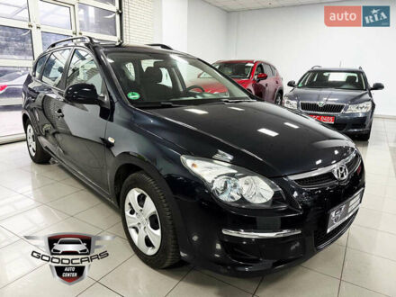 Черный Хендай i30, объемом двигателя 1.4 л и пробегом 190 тыс. км за 6900 $, фото 1 на Automoto.ua