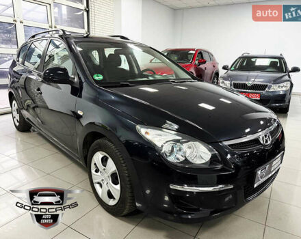 Черный Хендай i30, объемом двигателя 1.4 л и пробегом 190 тыс. км за 6900 $, фото 1 на Automoto.ua