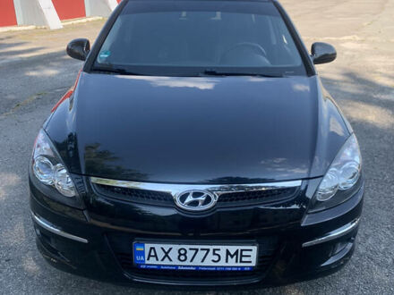 Черный Хендай i30, объемом двигателя 1.4 л и пробегом 92 тыс. км за 5800 $, фото 1 на Automoto.ua