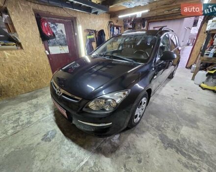 Черный Хендай i30, объемом двигателя 1.6 л и пробегом 231 тыс. км за 5600 $, фото 1 на Automoto.ua