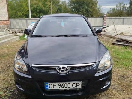 Черный Хендай i30, объемом двигателя 1.4 л и пробегом 215 тыс. км за 5500 $, фото 1 на Automoto.ua
