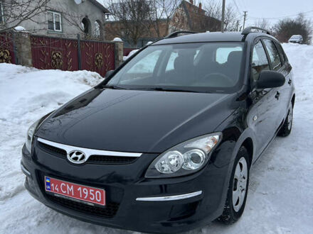 Черный Хендай i30, объемом двигателя 1.4 л и пробегом 144 тыс. км за 5800 $, фото 1 на Automoto.ua