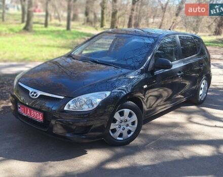 Черный Хендай i30, объемом двигателя 1.4 л и пробегом 162 тыс. км за 6300 $, фото 1 на Automoto.ua