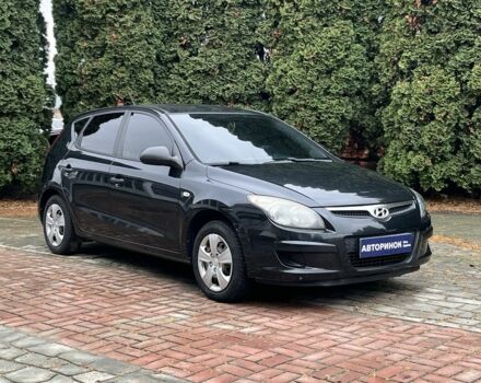 Черный Хендай i30, объемом двигателя 1.4 л и пробегом 240 тыс. км за 6000 $, фото 1 на Automoto.ua
