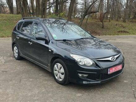 Черный Хендай i30, объемом двигателя 1.4 л и пробегом 149 тыс. км за 6100 $, фото 1 на Automoto.ua