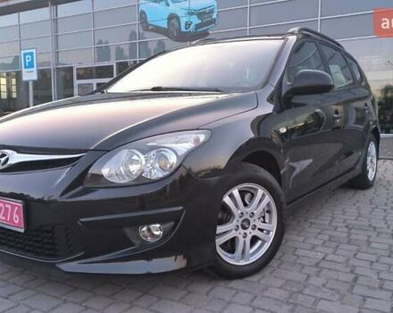Черный Хендай i30, объемом двигателя 1.59 л и пробегом 245 тыс. км за 6990 $, фото 1 на Automoto.ua