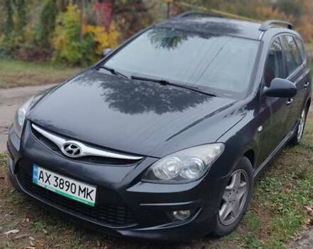 Черный Хендай i30, объемом двигателя 1.4 л и пробегом 216 тыс. км за 5650 $, фото 1 на Automoto.ua