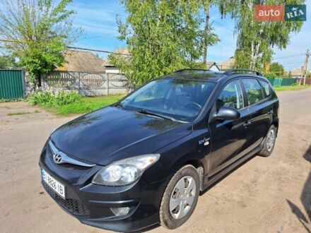 Чорний Хендай i30, об'ємом двигуна 1.6 л та пробігом 320 тис. км за 6100 $, фото 1 на Automoto.ua