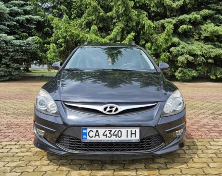 Черный Хендай i30, объемом двигателя 1.4 л и пробегом 157 тыс. км за 6700 $, фото 1 на Automoto.ua